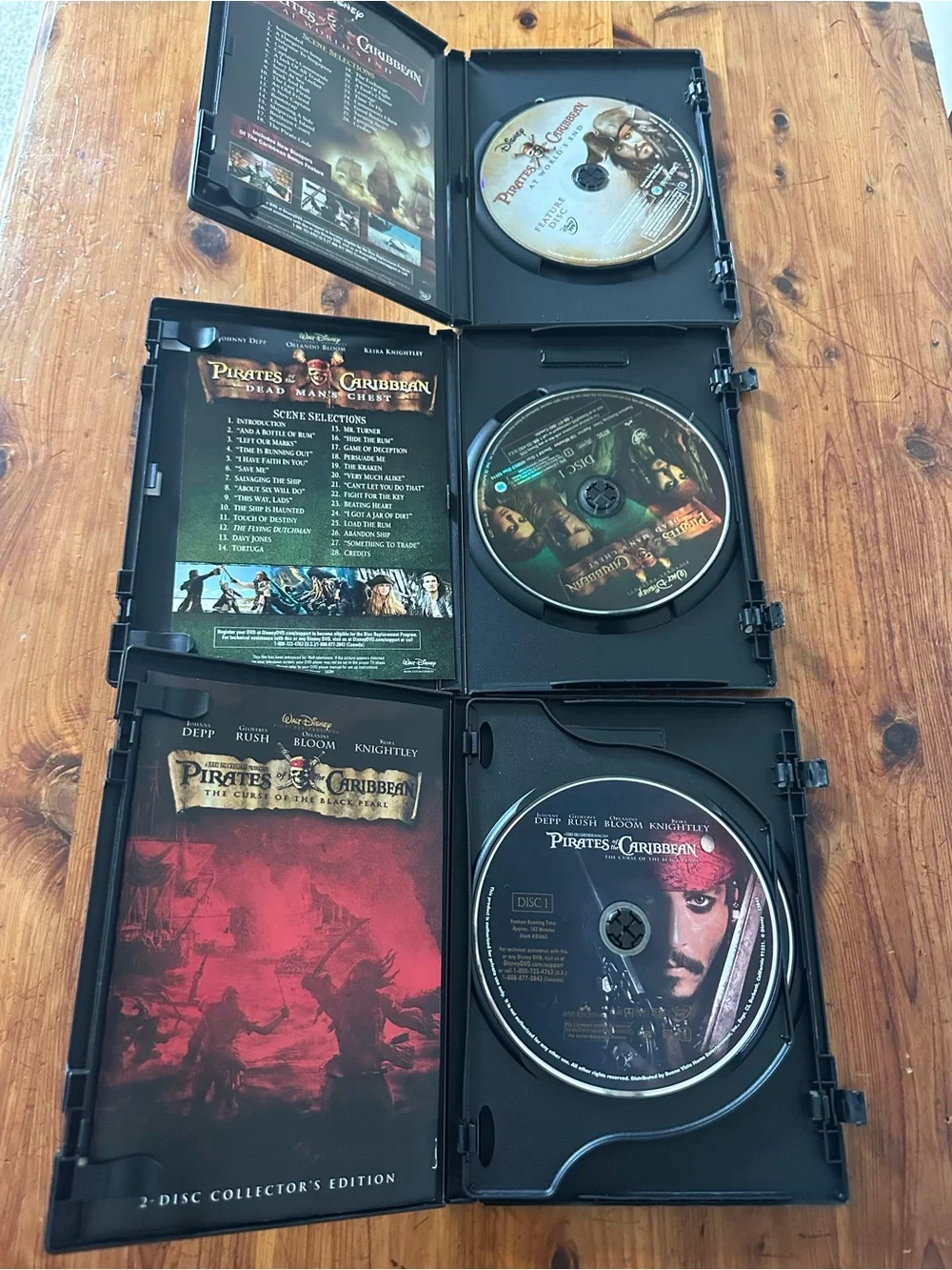 Disney Pirates of the Caribbean DVD Set — Black Cases with Multicolor Artwork